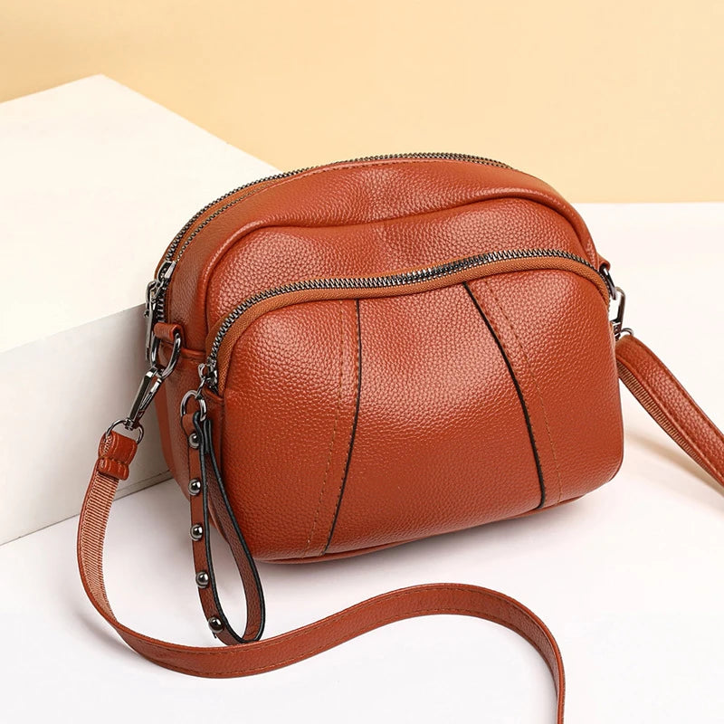 Solid Color Fashionable Rivet Zipper Bag Simple Soft Leather.