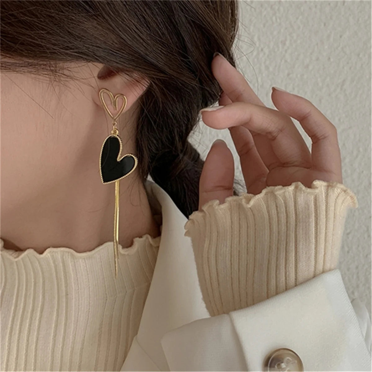 Asymmetric Hollow Black Heart Dangle Earrings.