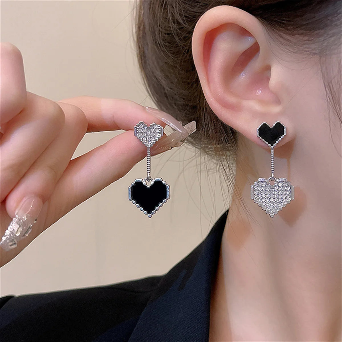 Asymmetric Hollow Black Heart Dangle Earrings.